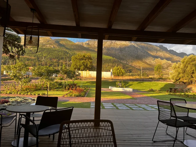 Klein Goederust terrace overlooking the garden and Franschhoek mountains